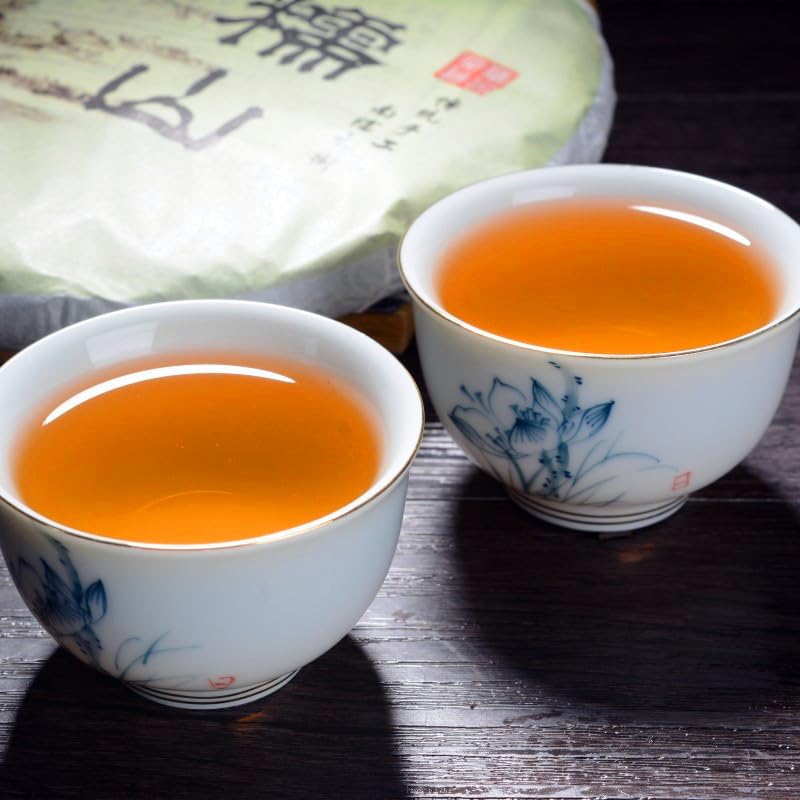 Natural and additive-free Yunnan Puerh Tea Puerh Raw Tea 357g Nannuo Mountain Big Tree Tea Healthy and Delicious Green tea 云南普洱茶 普洱生茶 南糯山大树茶