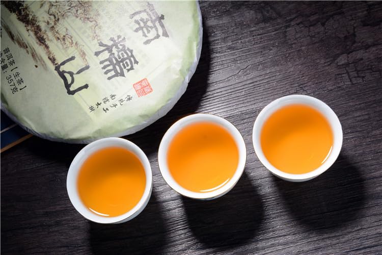 Natural and additive-free Yunnan Puerh Tea Puerh Raw Tea 357g Nannuo Mountain Big Tree Tea Healthy and Delicious Green tea 云南普洱茶 普洱生茶 南糯山大树茶