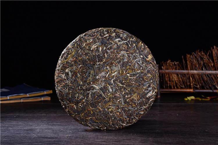 Natural and additive-free Yunnan Puerh Tea Puerh Raw Tea 357g Nannuo Mountain Big Tree Tea Healthy and Delicious Green tea 云南普洱茶 普洱生茶 南糯山大树茶