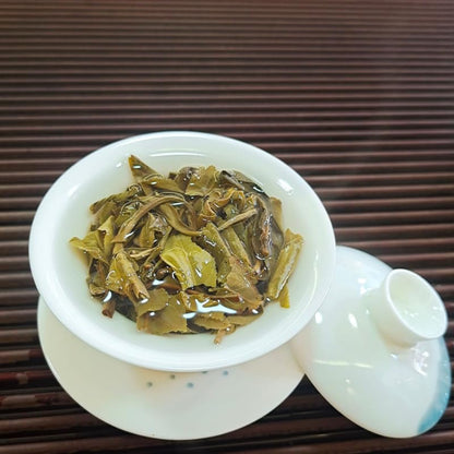 Natural and Additive-free Yunnan Puerh Tea Qizi Cake Raw Tea YiBang Raw Tea Green Tea 357g Deliciously Smooth Puerh Tea 云南普洱茶七子饼生茶倚邦生茶 357克