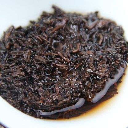 Natural Without Additives Yunnan Puerh Tea aged Jingmai Ancient Tea Cooked Tea 357g Premium Qizi Cakes Healthy and Delicious Black Tea云南普洱茶景迈古树熟茶357克特级祁子饼红茶