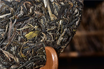 Yunnan Puerh Tea Organic Puerh Raw Tea Green Tea Puerh Tea Cake 357g / 12.59oz Deliciously Smooth Nannuo Mountain First Spring Qiao Mu Tea 云南普洱茶 普洱生茶 南糯山头春乔木茶