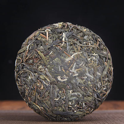 Yunnan Menghai Tea District Sun-dried Green Old Ancient Tree Raw Materials Tightly Pressed Puerh Raw Tea Cakes 100g Green Tea 云南勐海茶区贺开晒青老古树原料紧压普洱生茶饼100g