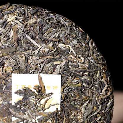 Premium Puerh Tea Raw Tea Yiwu 300 First Spring Large Tree Qiaomu Tea 357g Rooster Zodiac Cake Chinese Green Tea 洱茶生茶 易武300头春大树乔木茶 357克鸡生肖饼