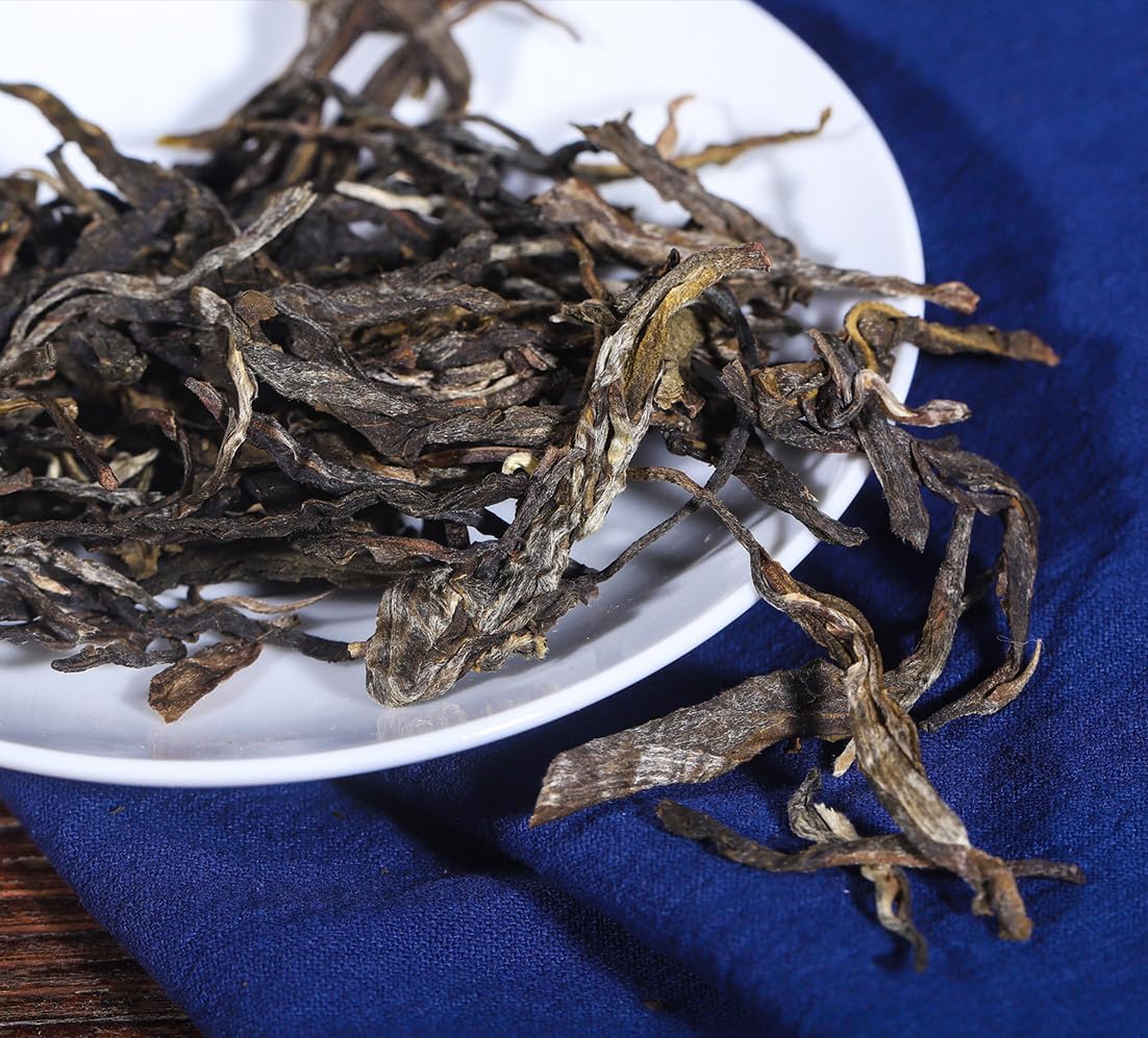 Yunnan Natural and Additive-free Puerh Tea 357g Daxueshan (Rui) Big Tree Old Tree 357g Puerh Tea Cake Chinese Green Tea 云南普洱茶 357克大雪山（瑞）大树 老树 357克普洱茶饼