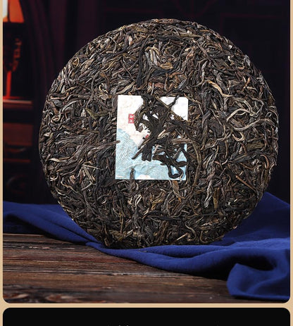 Yunnan Natural and Additive-free Puerh Tea 357g Daxueshan (Rui) Big Tree Old Tree 357g Puerh Tea Cake Chinese Green Tea 云南普洱茶 357克大雪山（瑞）大树 老树 357克普洱茶饼