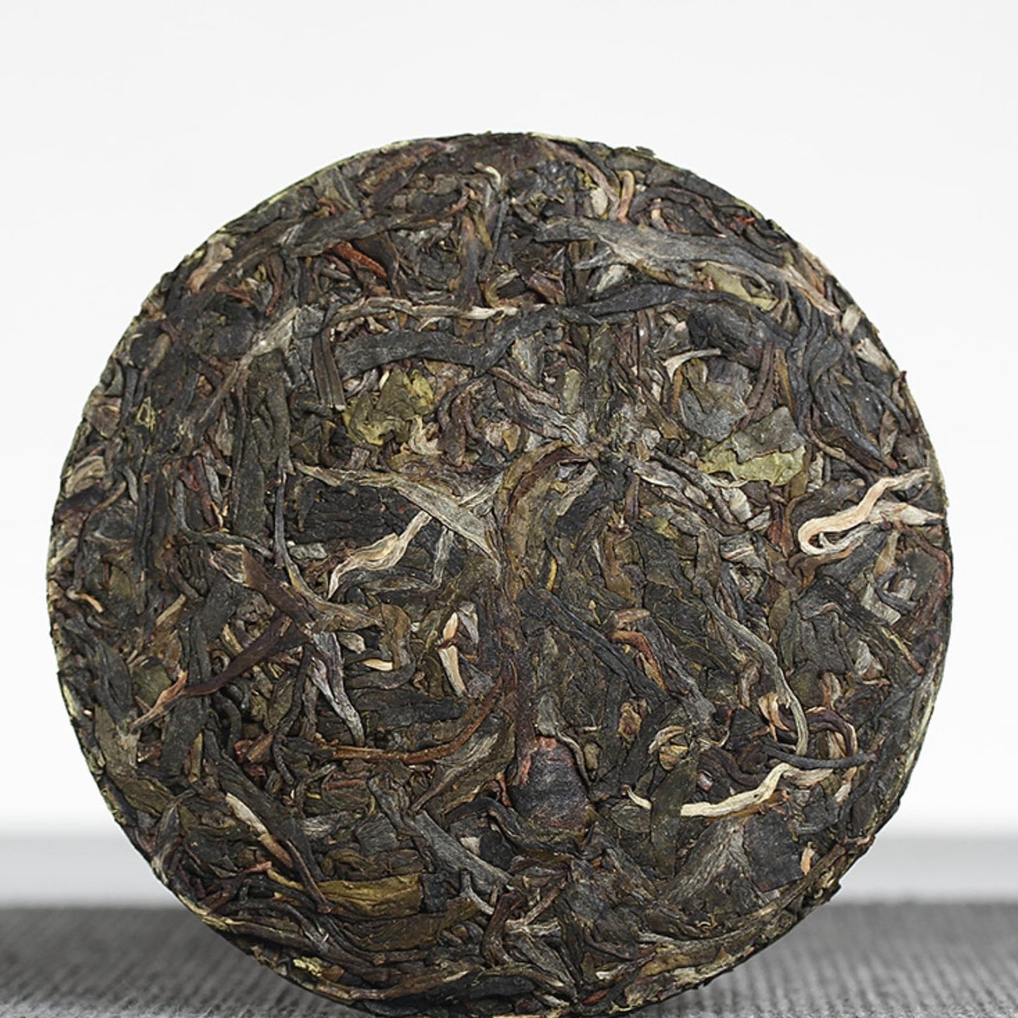 Yunnan Natural and additive-free Puerh Tea 100g Iceland Honey Rhythm Small Cake (Chong) Large Tree Puerh Raw Cake green tea 云南普洱茶 100克冰岛蜜韵小饼（崇)大树普洱生饼