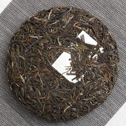 Yunnan Natural Puerh Tea 200g Icelandic Puerh Raw Tea Aged Puerh Raw Tea Cakes Green Tea Delicious Smooth Puerh Tea 云南普洱茶 200克冰岛普洱生茶 陈年普洱生茶饼