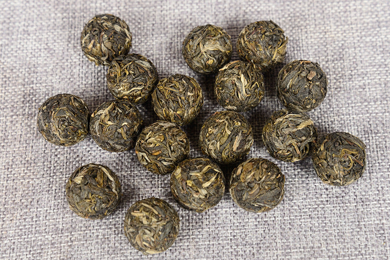 Yunnan Pu-erh Tea Raw Tea QiaoMu Pu-erh Dragon Pearl First Spring Spring Tea Iceland Sweet 500g Dragon Pearl Tea