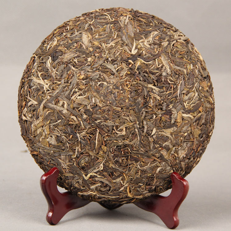 Yunnan Pu'er Tea Yiwu Ancient Tree Pure Material Xishuangbanna Qizi Cake Tea 357g Traditional Pu'er Tea Green Tea