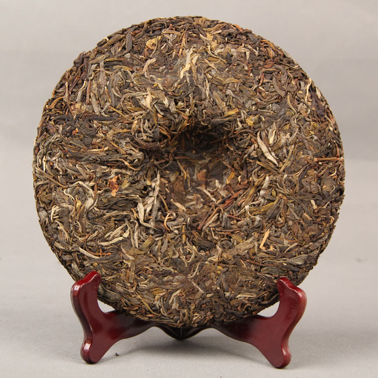 Yunnan Pu'er Tea Yiwu Ancient Tree Pure Material Xishuangbanna Qizi Cake Tea 357g Traditional Pu'er Tea Green Tea