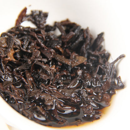 Icelandic Ancient Tree Golden Bud Old Tea Ecological Ancient Tree Tea Yunnan Qizi Cake Ripe Tea Black Tea 357g