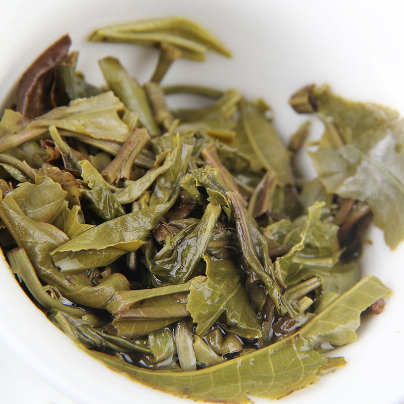 China Yunnan Early Spring Tea Yunnan Pu'er Raw Tea Brown Early Spring Sprout Spring Tip Qizi Cake Tea 357g