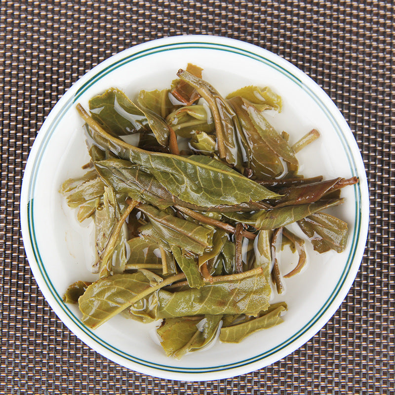 Spring Tea Leaf Yunnan Mengku Icelandic Puerh Tea Raw Tea Cake Yunnan Ancient Tree Tea 357g Green Tea