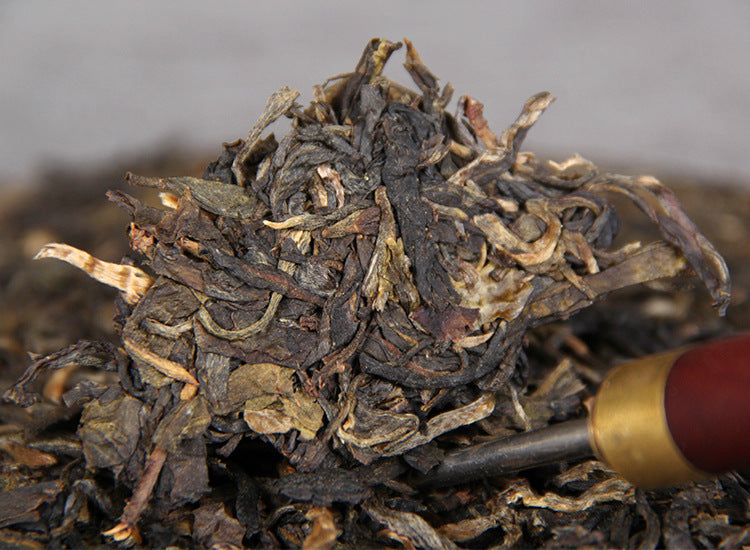 Pu'er Tea Yunnan Nannuo Mountain Qiaomu Seven Son Round Tea Aged Raw Tea Cake Green Tea 357g