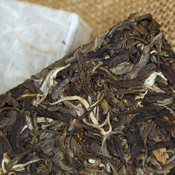 Yunnan Puerh Tea Puerh Tea Raw Tea Green tea Mengku High Mountain Tree Large Tree Puerh Raw Tea Brick Tea 250g