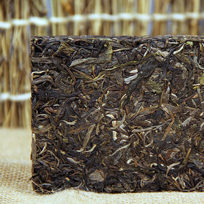 Yunnan Puerh Tea Puerh Tea Raw Tea Green tea Mengku High Mountain Tree Large Tree Puerh Raw Tea Brick Tea 250g