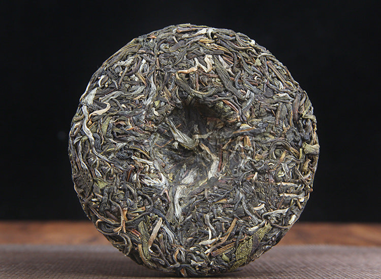 Yunnan Menghai Tea District Old Ancient Tree Raw Material Tightly Pressed Pu'er Raw Tea Cake 100g Qizi Cake Tea Green Tea