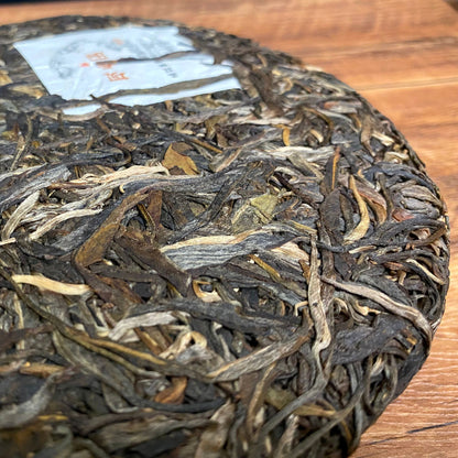 Yunnan Qizi Cake Raw Pu-erh Tea 357g Brown Mountain Pu-erh Tea