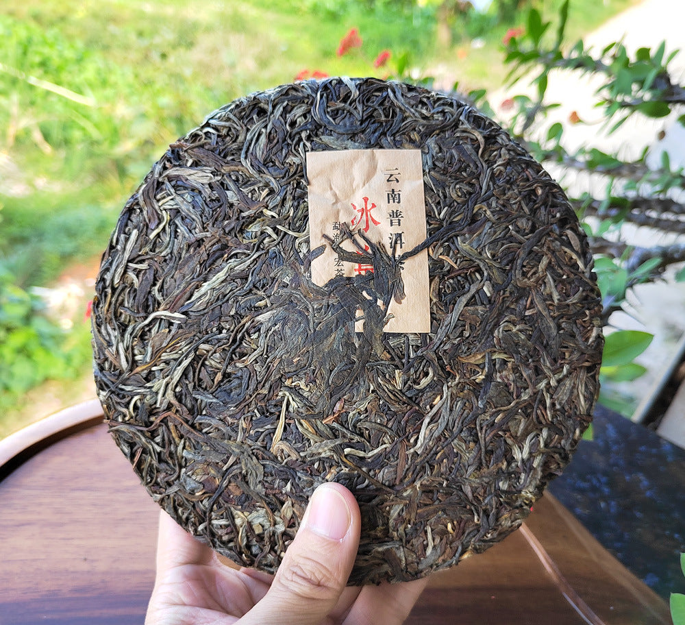 Icelandic Pu'er Tea Ancient Tree First Spring Pu'er Raw Tea 357g Mengku Old Tree Yunnan Qizi Cake Green Tea