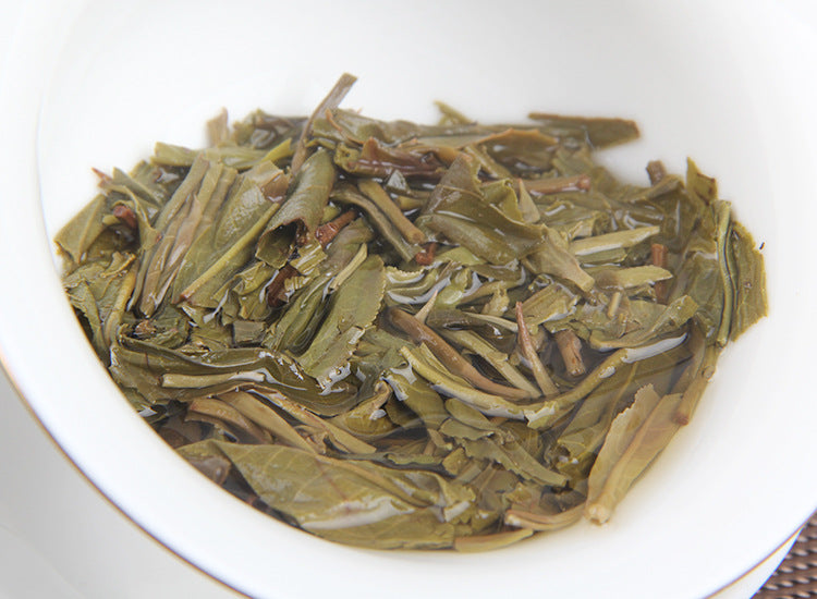 Yunnan Pu'er Tea Leaves Raw Tea Cake Xigui Wilderness Tea 100g/cake Ancient Tree Non-Lao Banzhang Icelandic Tea Leaves